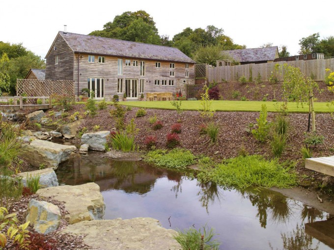 Border Oak house with natural water stream